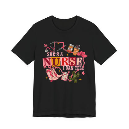 She's a Nurse I Can Tell T-Shirt — Cute Pink Nurse Graphic Tee for Nurses